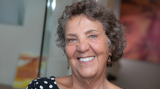 patient showing her dental implants Vancouver, BC