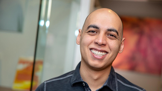 patient showing his invisalign results Vancouver, BC